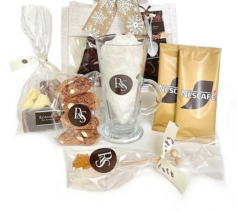 Coffee and chocolate gift bag. Contents - glass mug, italian biscuits, chocolates , sugar swizzle sticks and coffee sachets.