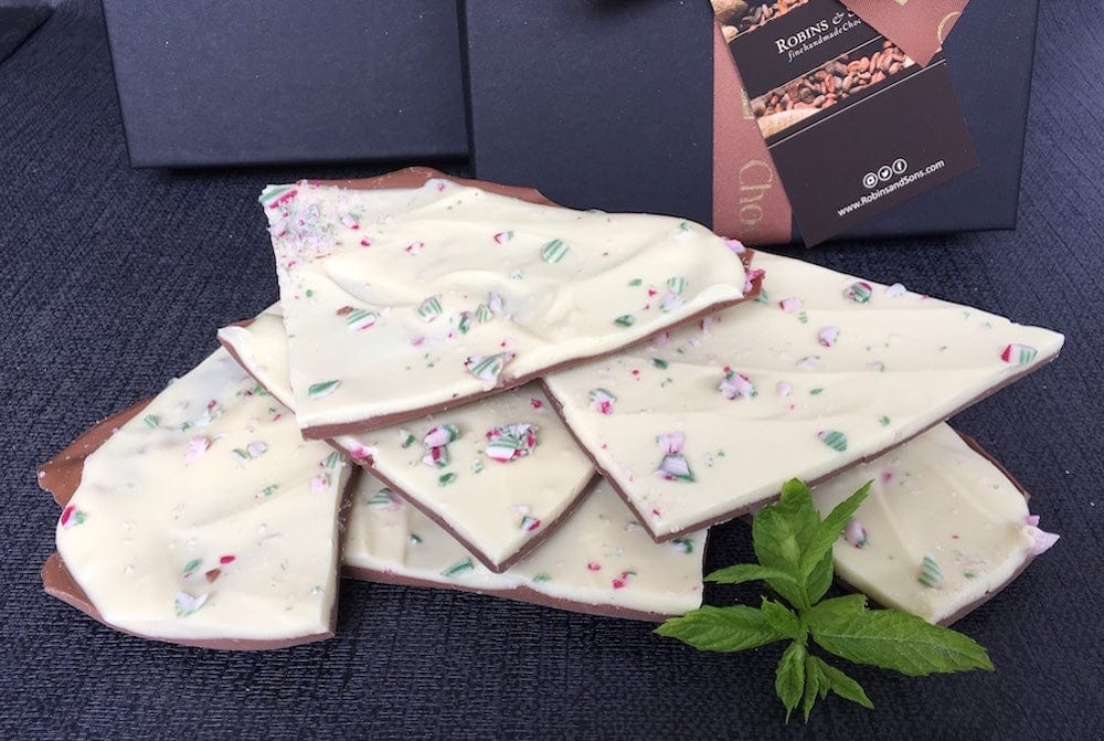 stacked pieces of layered milk and white mint chocolate - peppermint bark 