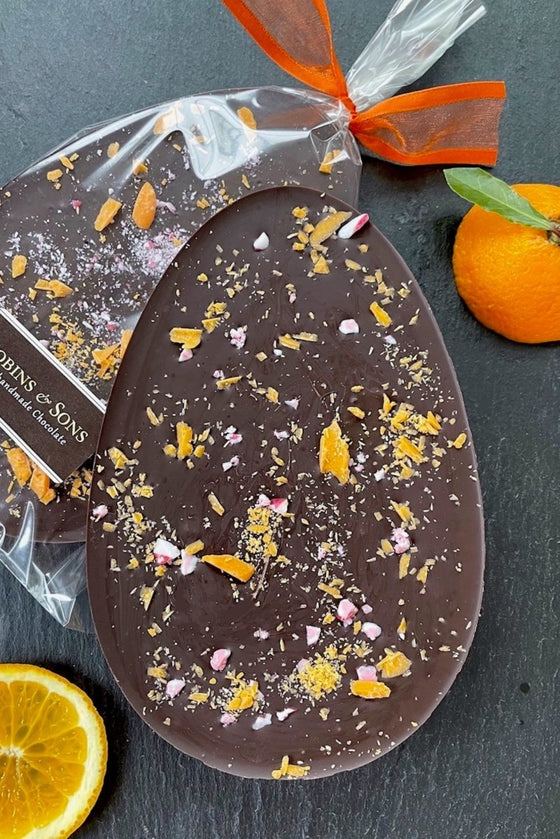 Handmade dark chocolate easter egg bar with valencian orange oil and topped with Belgian orange chocolate