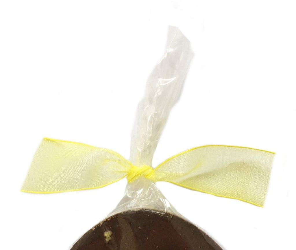 Sicilian lemon Crunch Easter Egg. Yellow ribbon bow.