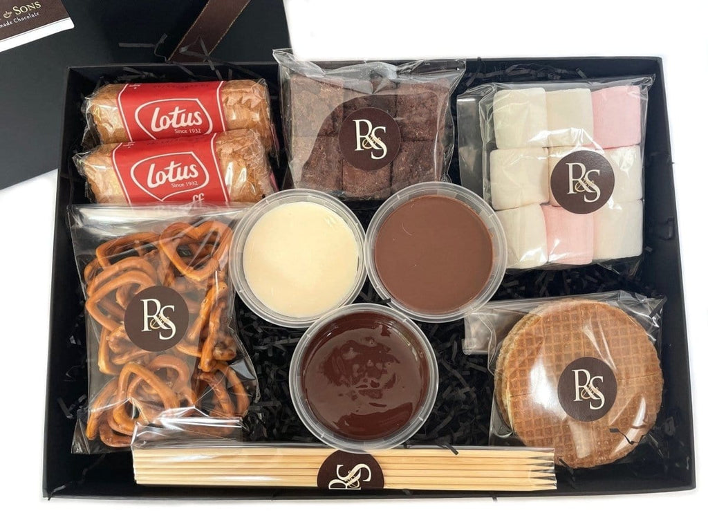 Chocolate Dipping Box. Chocolate Fondue kit with chocolate melting pots, pretzels, lotus biscuits, marshmallows, caramel waffles, brownies / wafer bites, skewers.