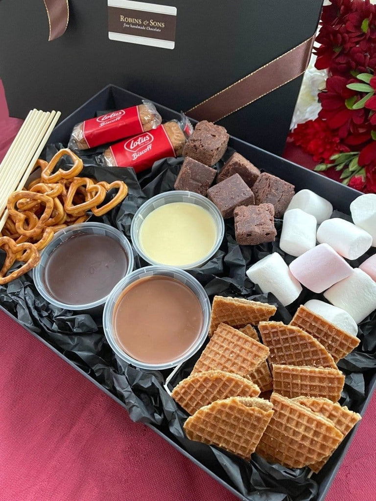 Chocolate Dipping Box. Chocolate Fondue kit with chocolate melting pots, pretzels, lotus biscuits, marshmallows, caramel waffles, brownies / wafer bites