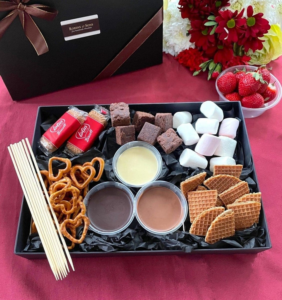 Chocolate Dipping Box. Chocolate Fondue kit with chocolate melting pots, pretzels, lotus biscuits, marshmallows, caramel waffles, brownies / wafer bites, skewers